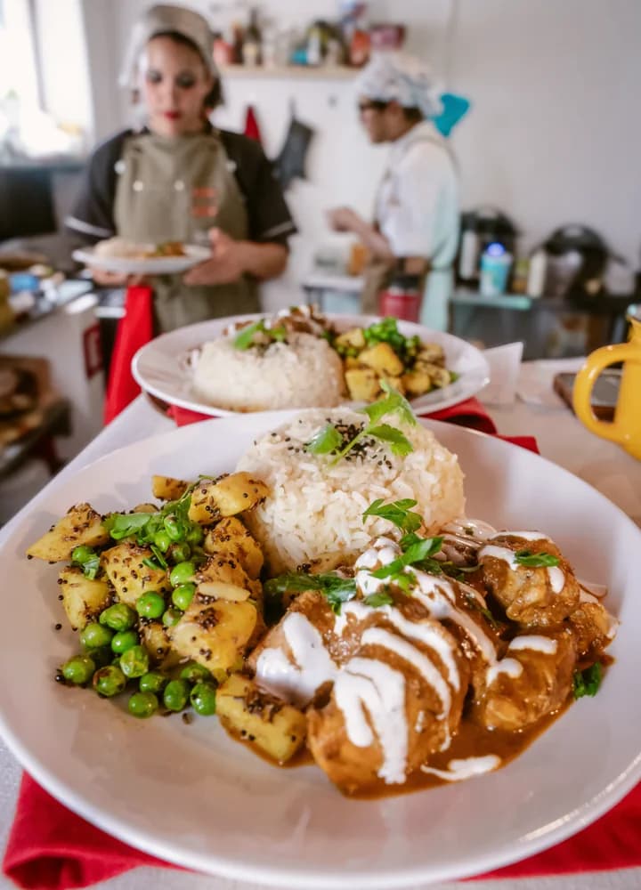 Several curry plates ready to share.